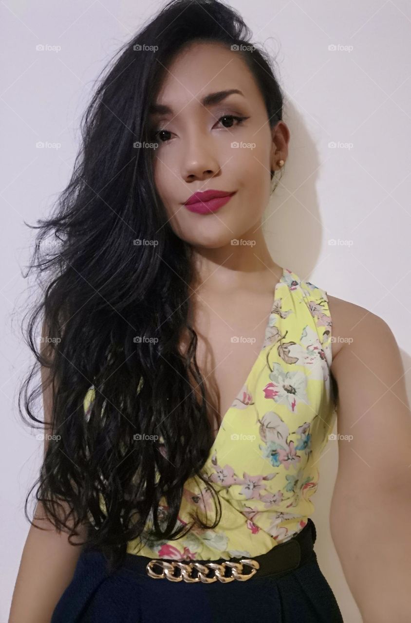 A woman with a yellow dress 