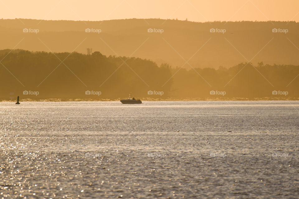 The sunset with its different shades of golden color