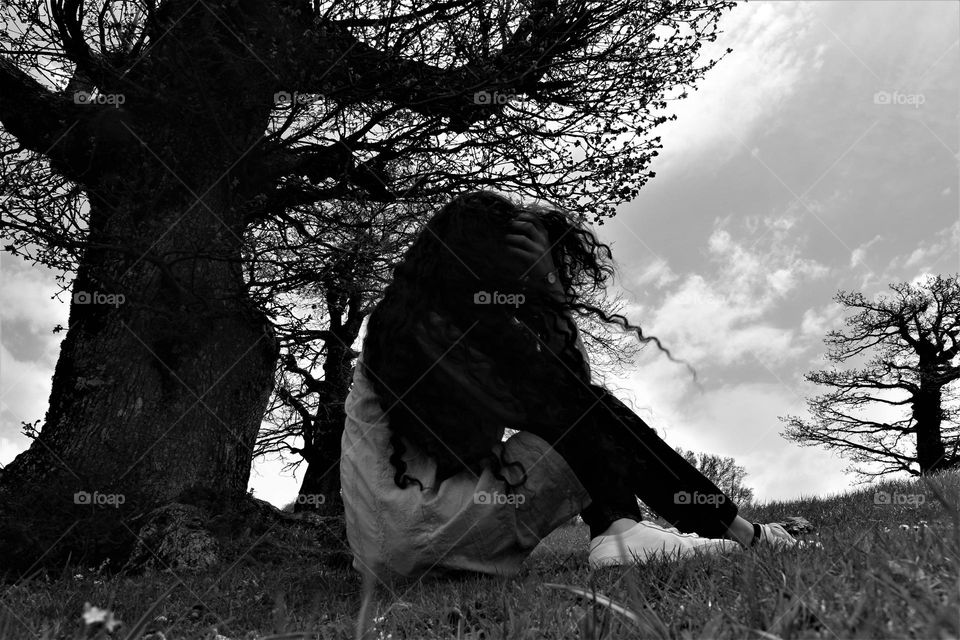 a curly girl in wind