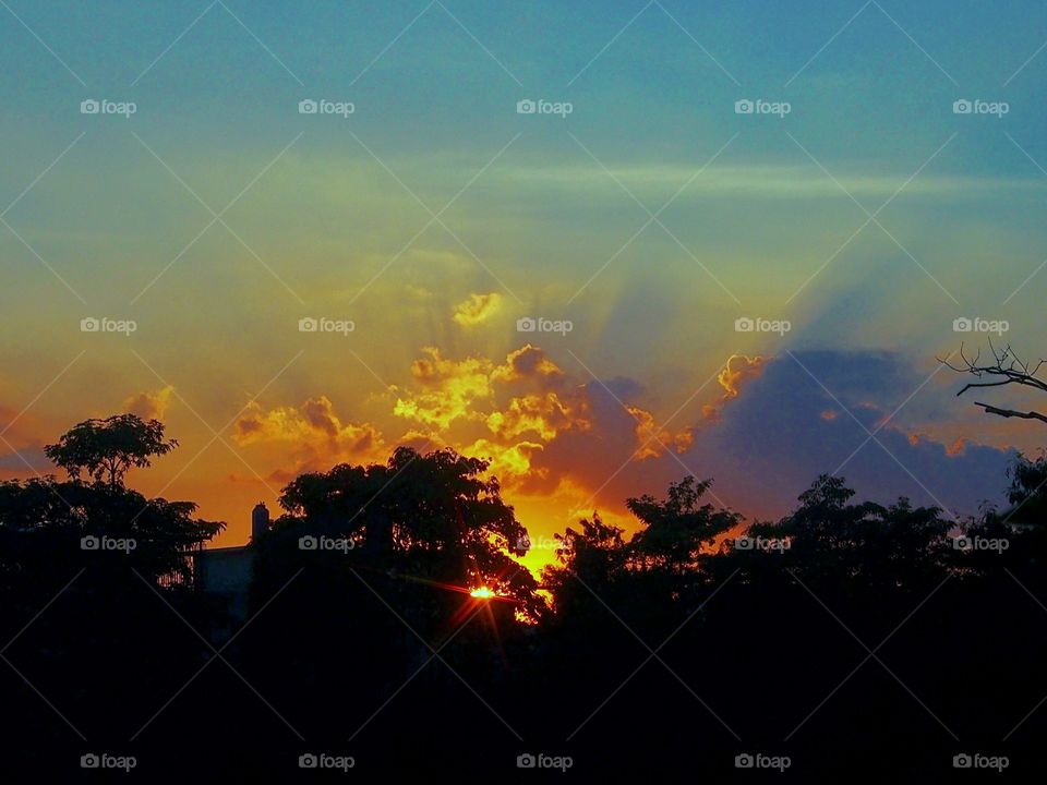 Sunlight through the cloud at sunset