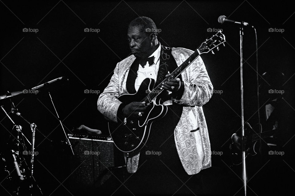 10 March 1996, the legendary Blues Boy, B. B. King performing at the Arena Hall in Poznan, Poland. American blues guitarist and singer-songwriter. Archival image could have imperfections as it is digital reproduction from b&w negative. Editorial use.