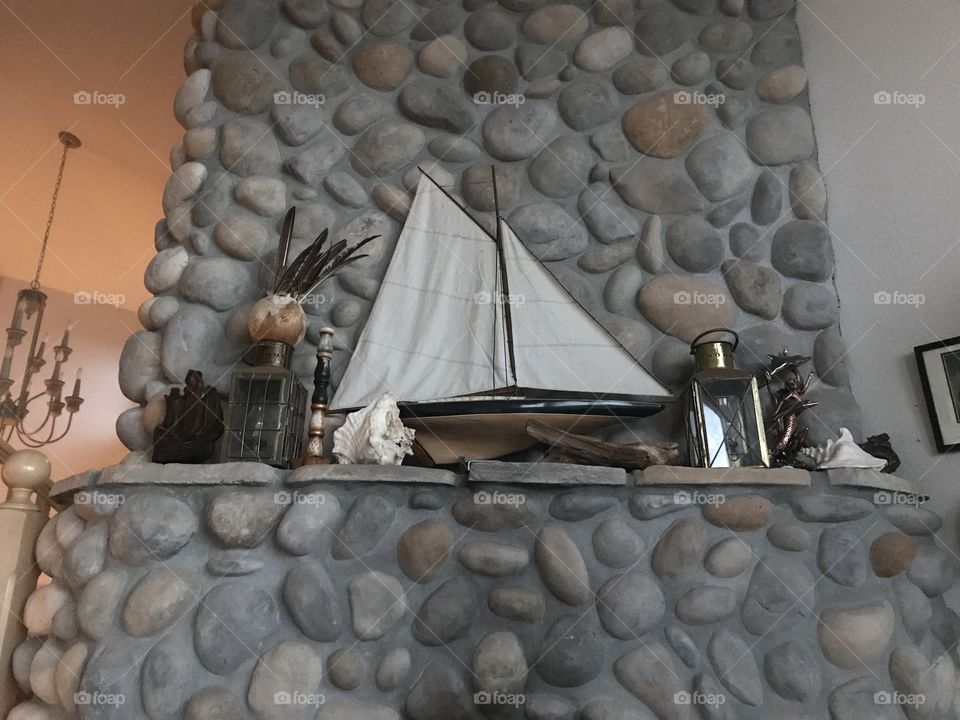 Boat with rock wall