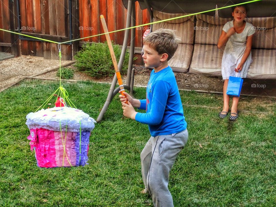 Swinging At A Piñata