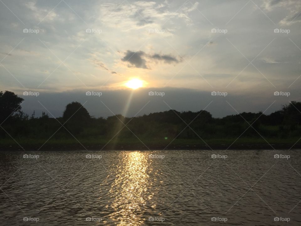 The Sun on A Lake in The Cambodian Fishing Village