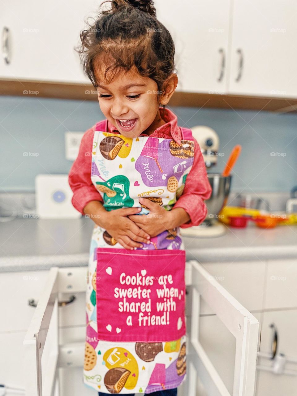 Toddler girl laughing in the kitchen, making cookies with Mommy, having fun making cookies, homemade cookies, baking in the kitchen, toddler and mommy in the kitchen