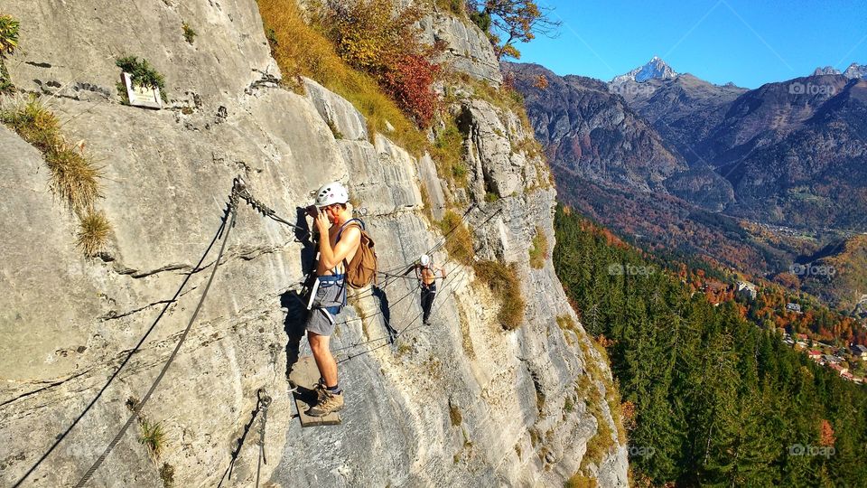 Climbing with friends in Zermatt, Switzerland by means of a Via ferrata system