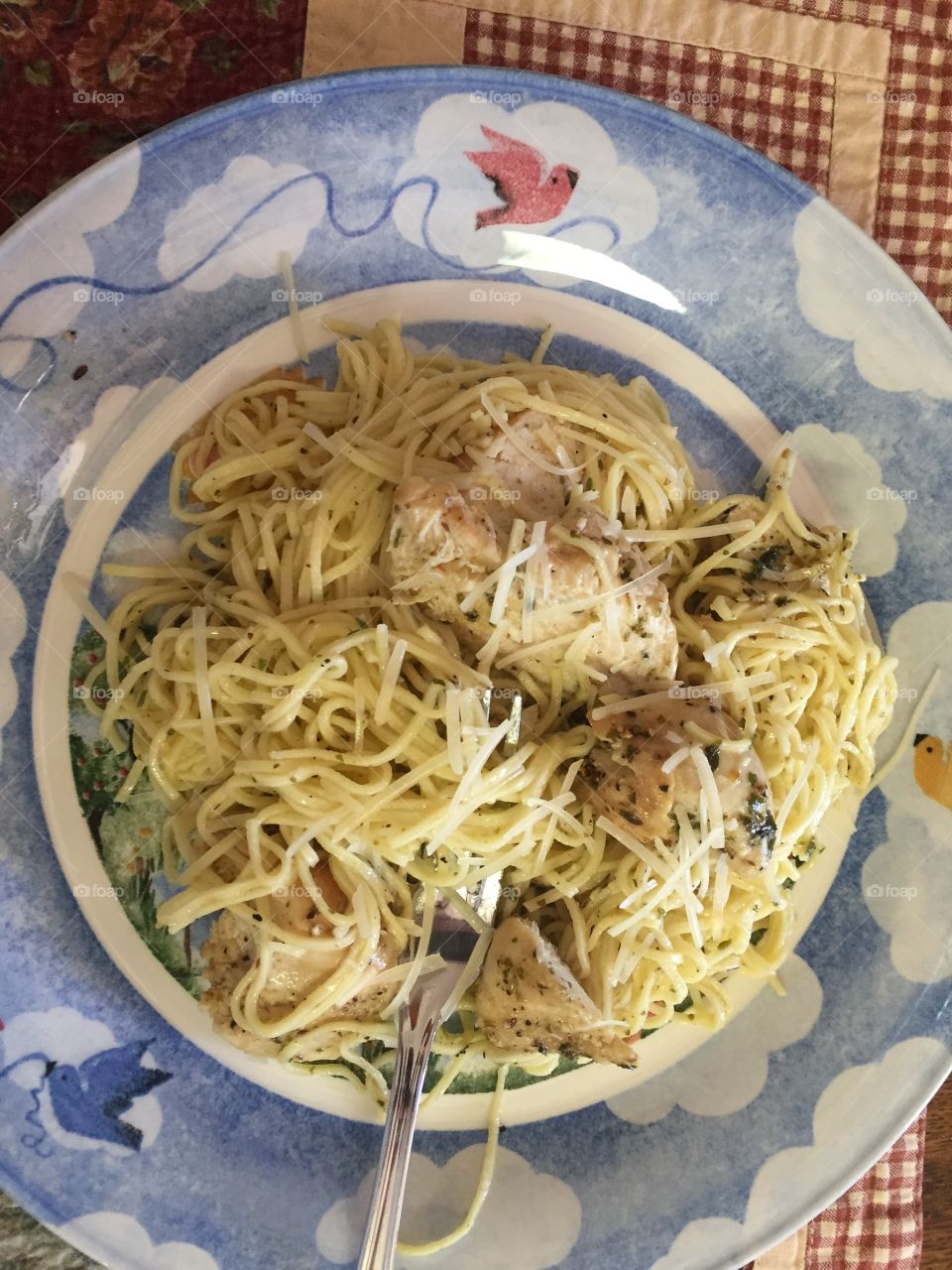 Plated chicken and Angel Hair Pasta 