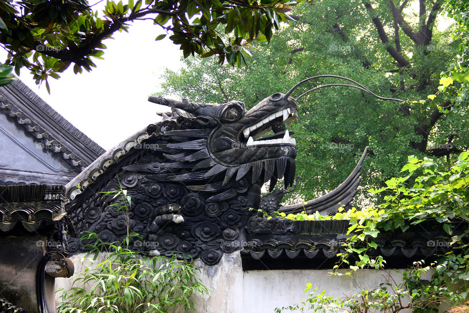 dragon statue in yuyuan garden. A dragon statue in yuyuan garden in shanghai china