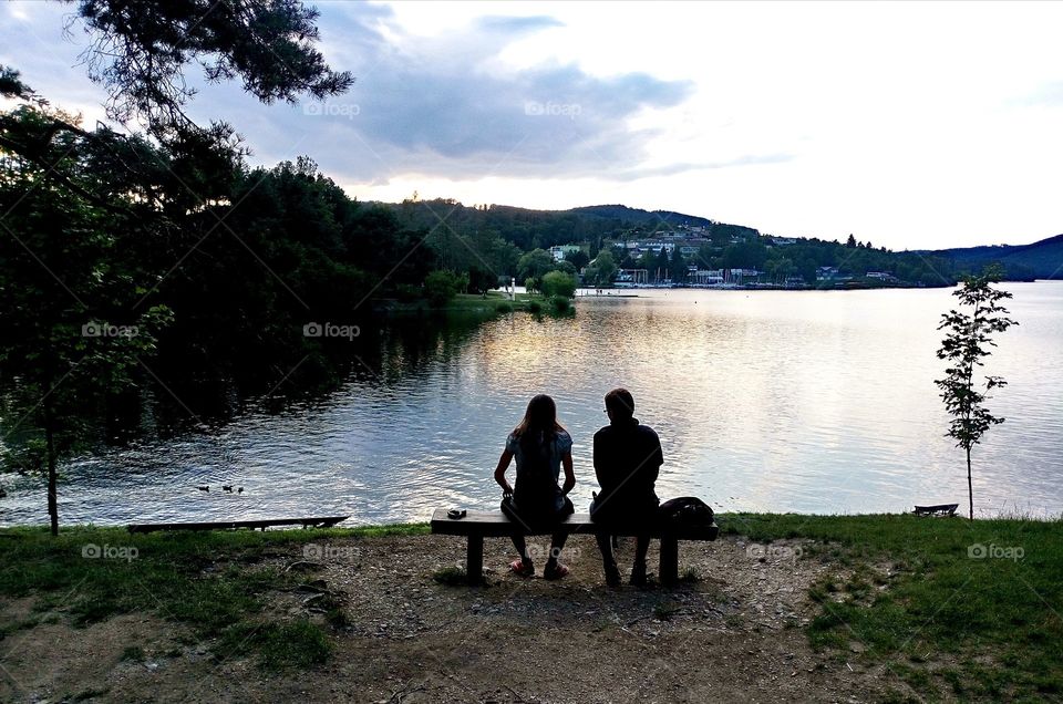 Couple of boys watching the sunset
