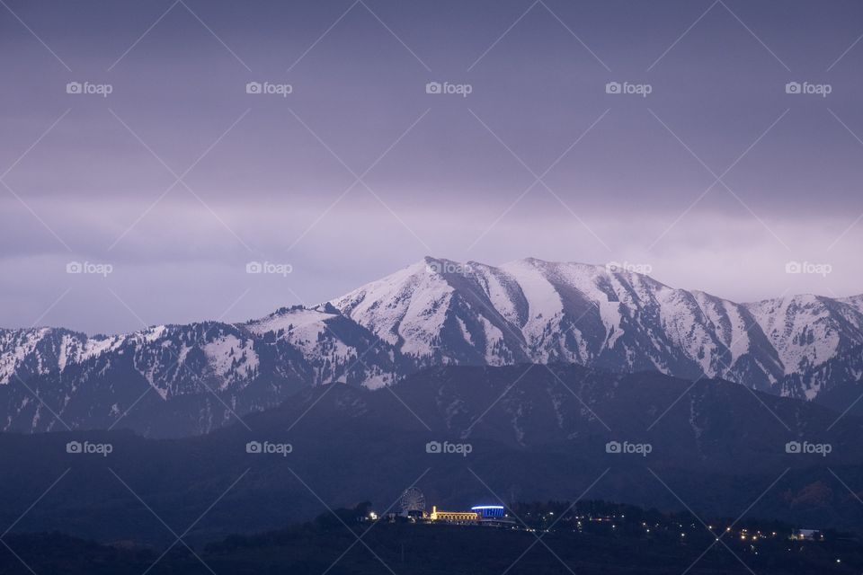 Beautiful cloudy day over Caucasus Mountains in Almaty Kazakhstan