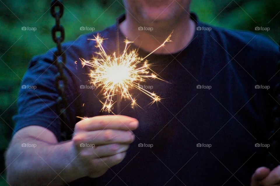 Man holding Sparkler 