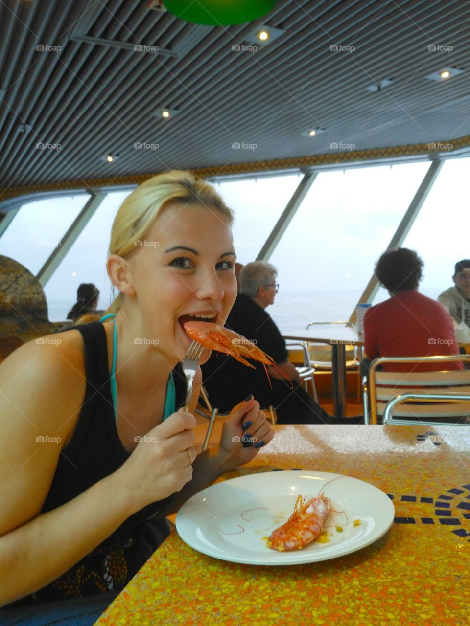 girl eating shrimp