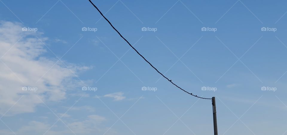 line in the blue sky