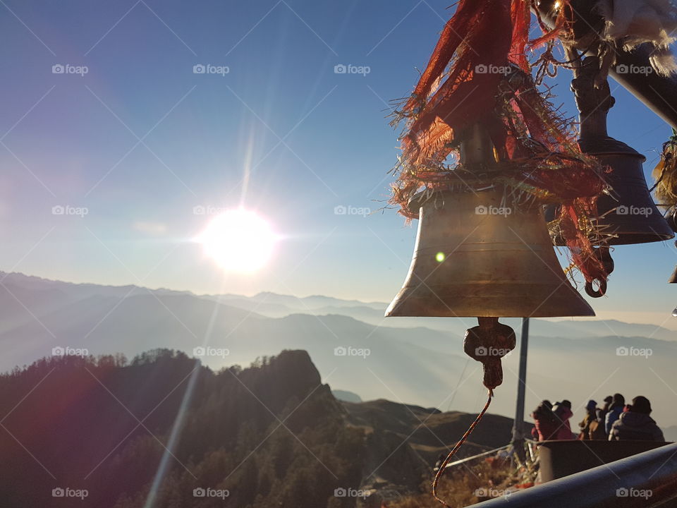 A temple bell on 4000m high mountain in Nepal, with beautiful landscapes