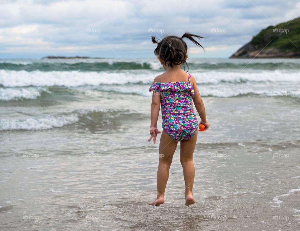 Jumping waves at the beach.