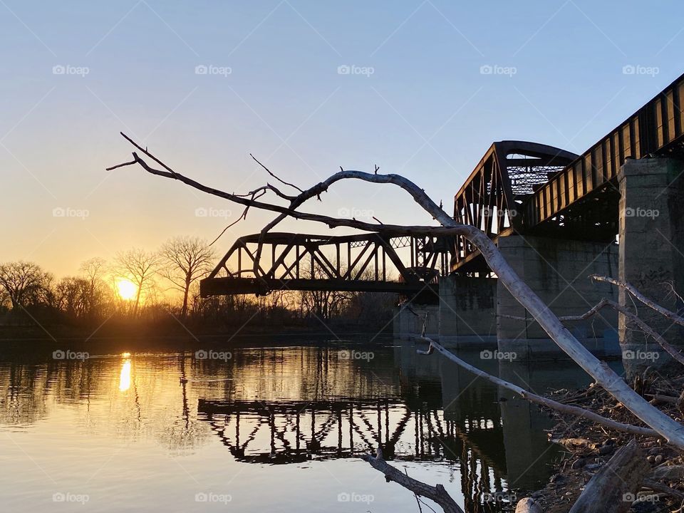 Train bridge at sunset 