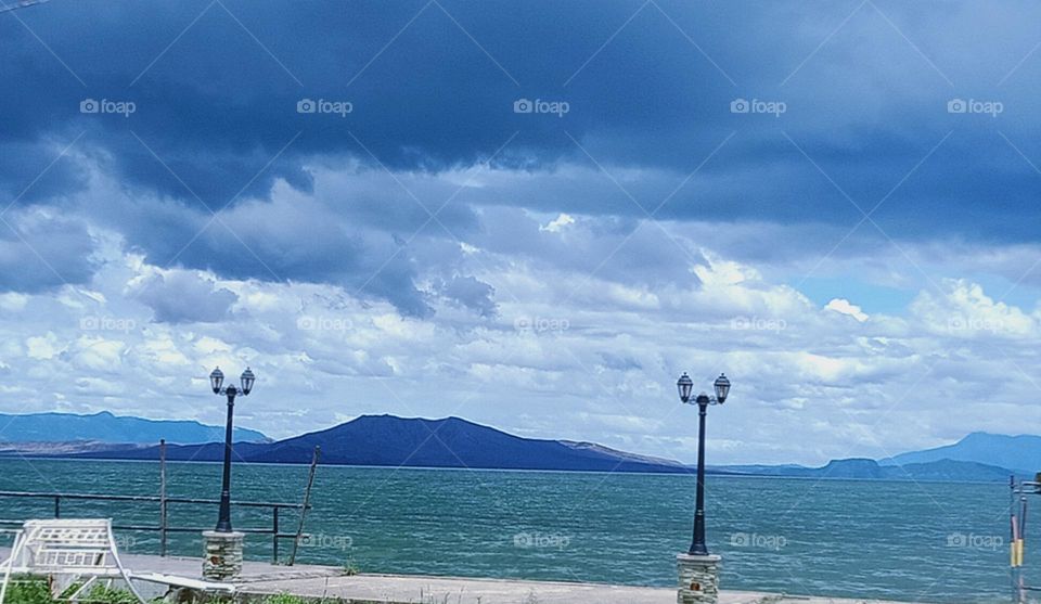 Taal Volcano is a large caldera filled by Taal Lake in the Philippines. Located in the province of Batangas, the volcano is second of the most active volcanoes in the country, with 38 recorded historical eruptions.