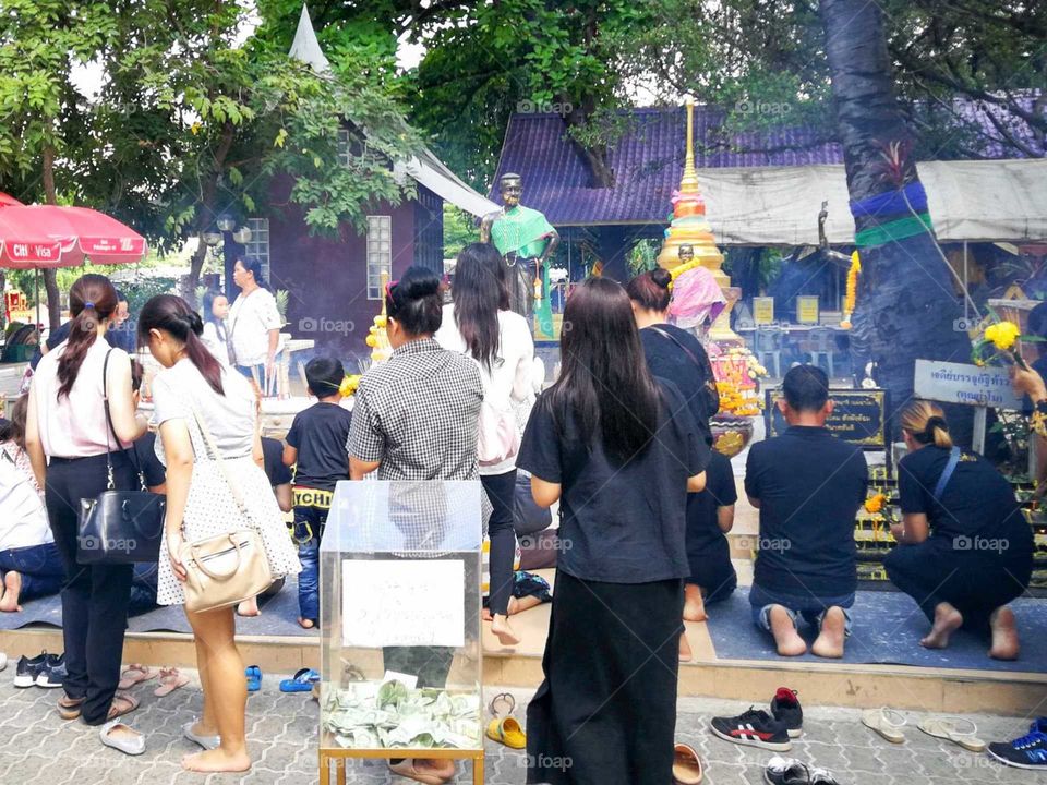 People worship to holy statue in Thailand