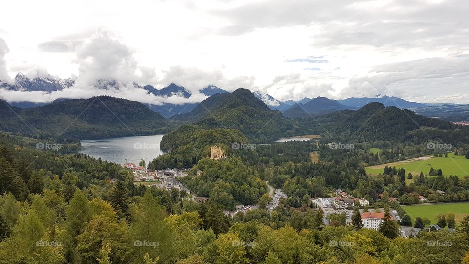 Fussen, magnificent landscape seen from above. Nature, mountains, trees, lake, castle, clouds...