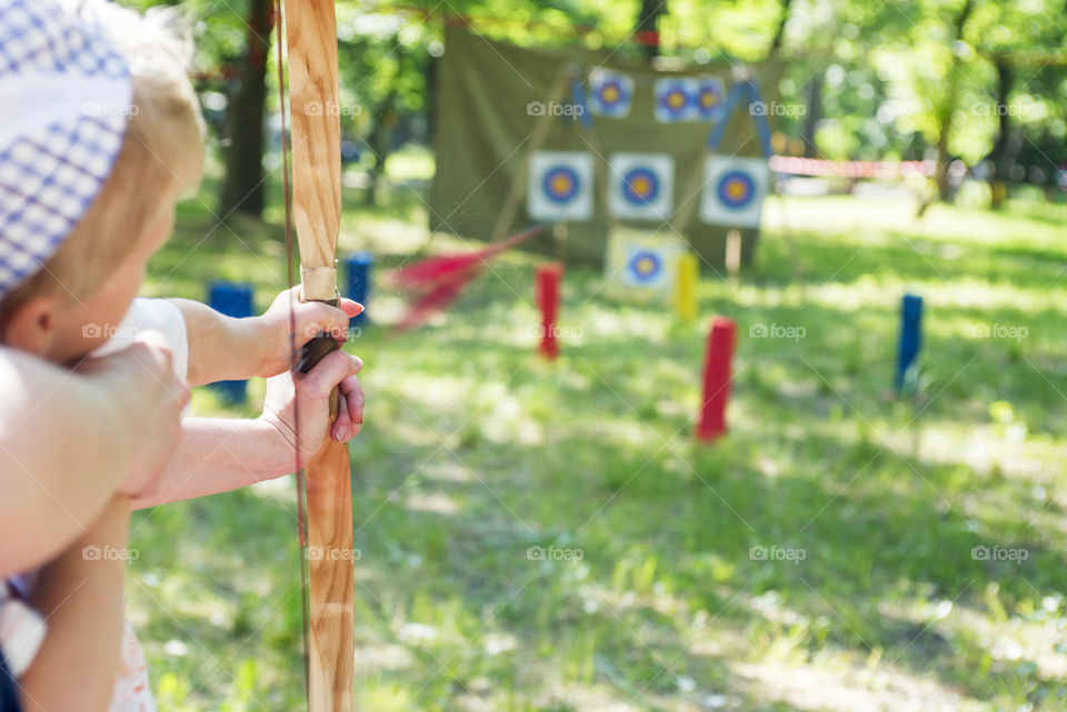 Shooting with bow on a target during an archery