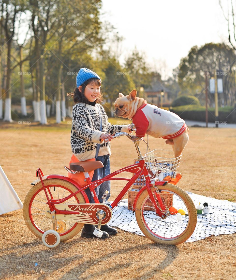 Kid And Dog Bike Bonding