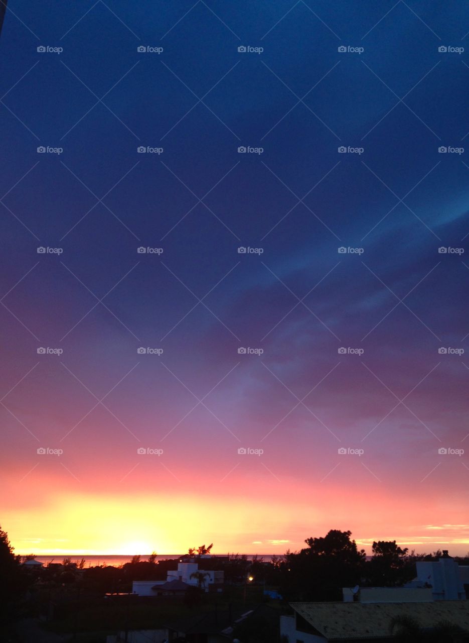 Sun rising in the sea