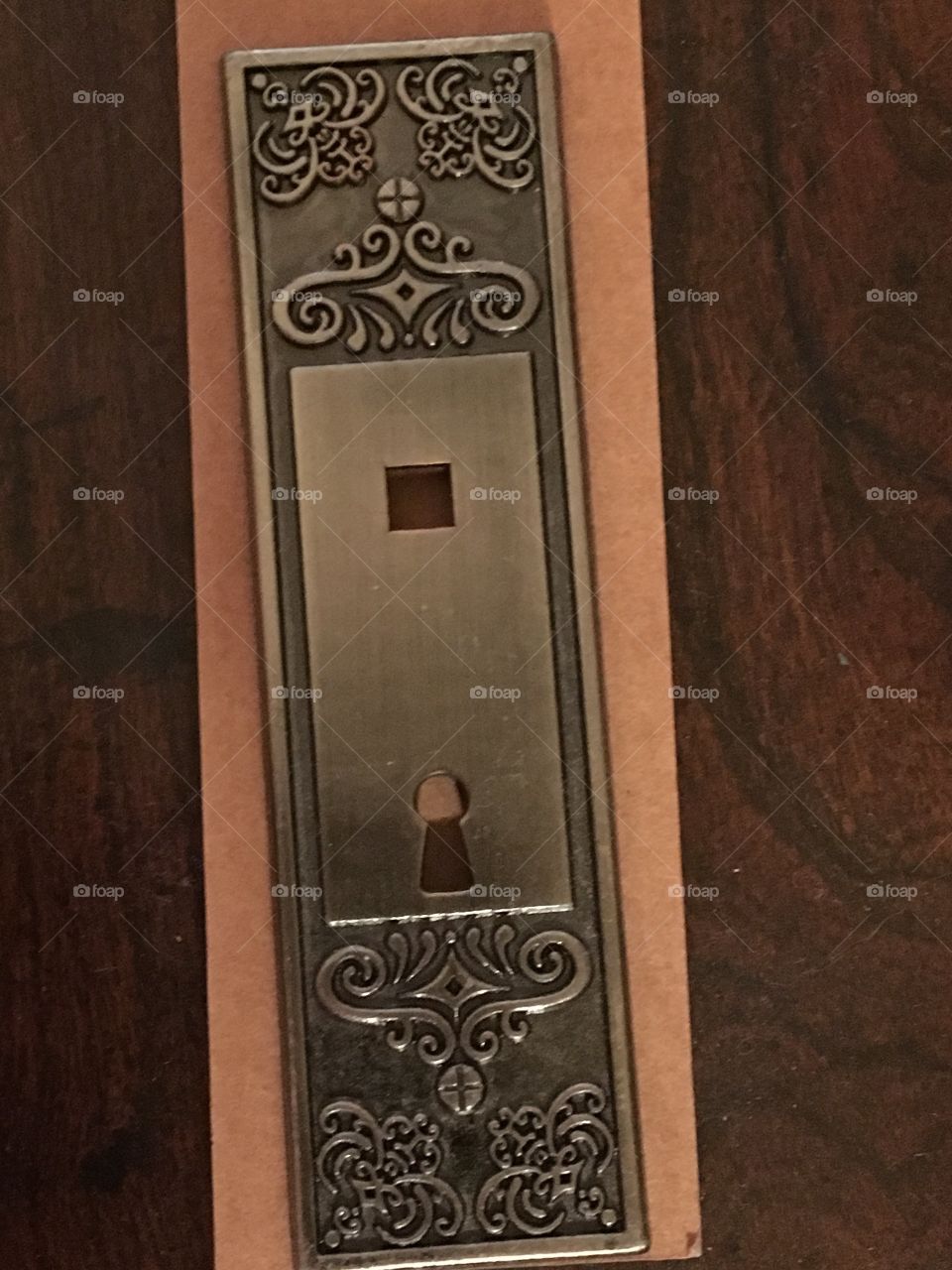 Brass ornate key hole