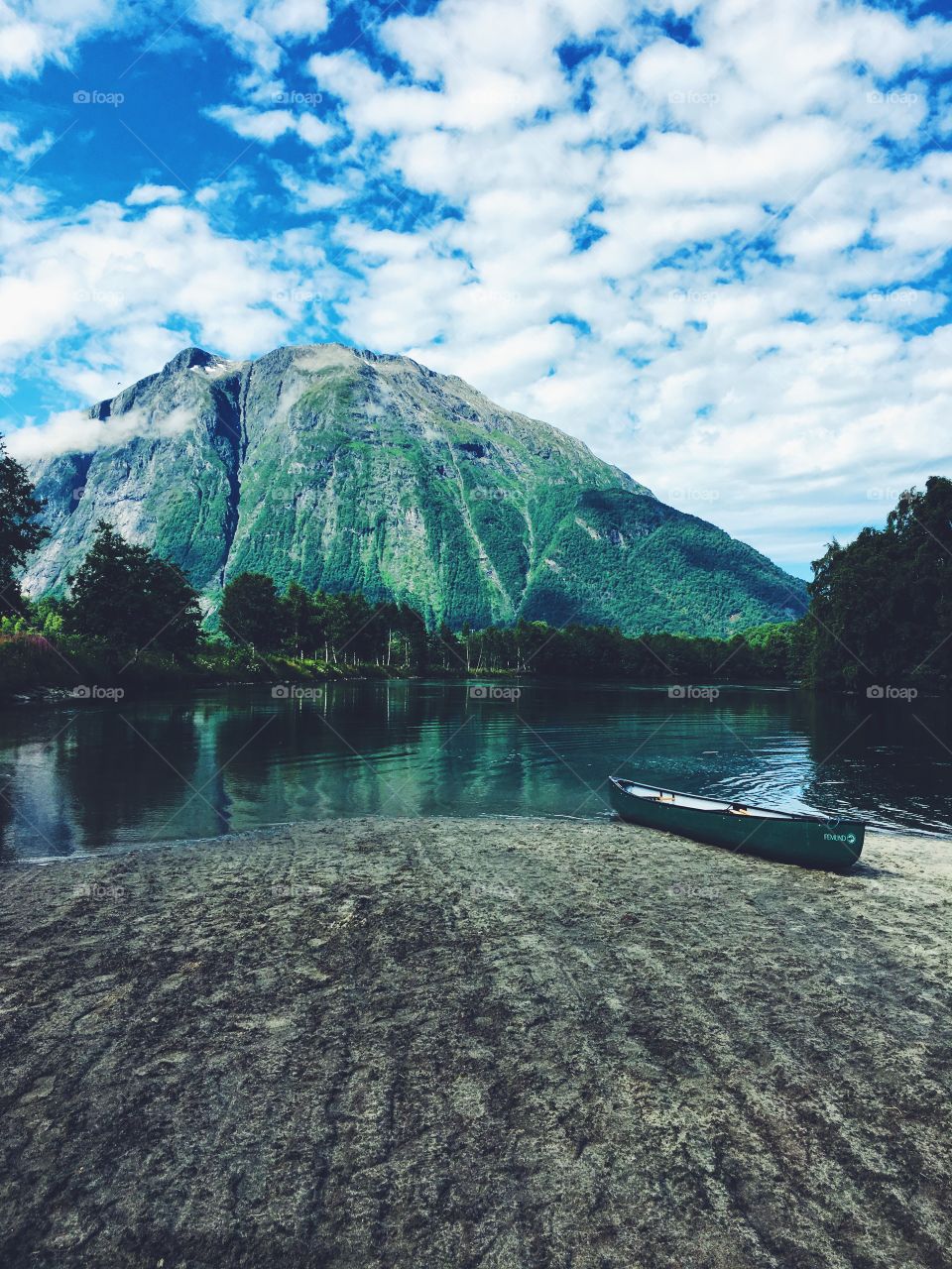 Idyllic view of boat at lake