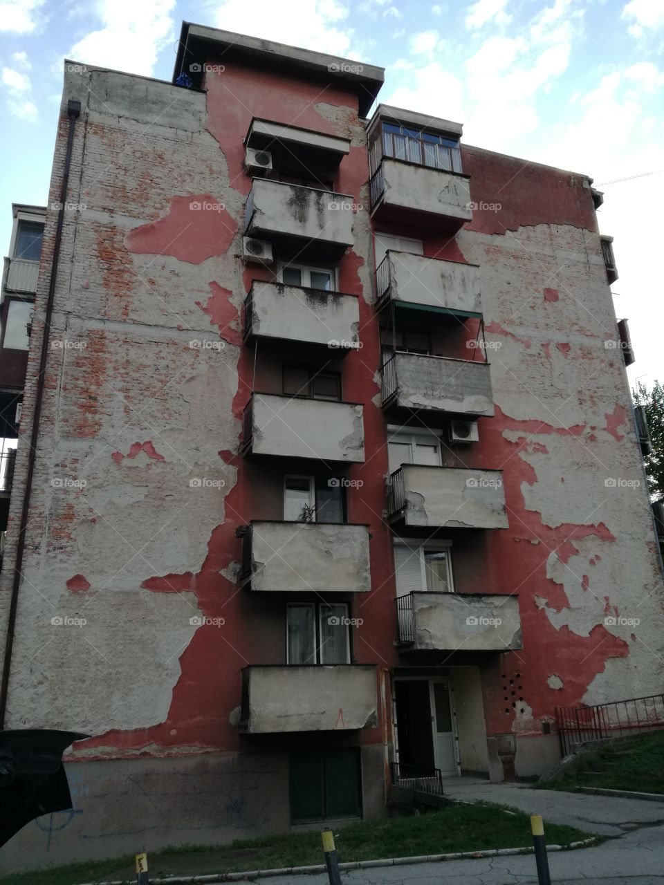 Autumn arrives and facade Is peeling of