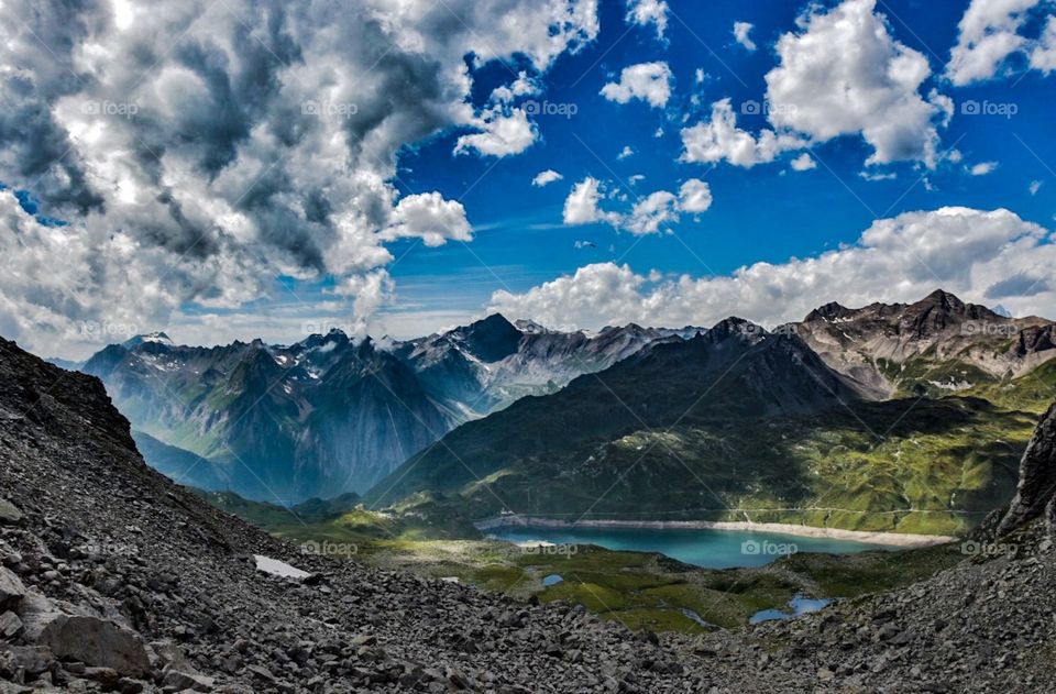 mountain landscape with lake in front, italian alps.