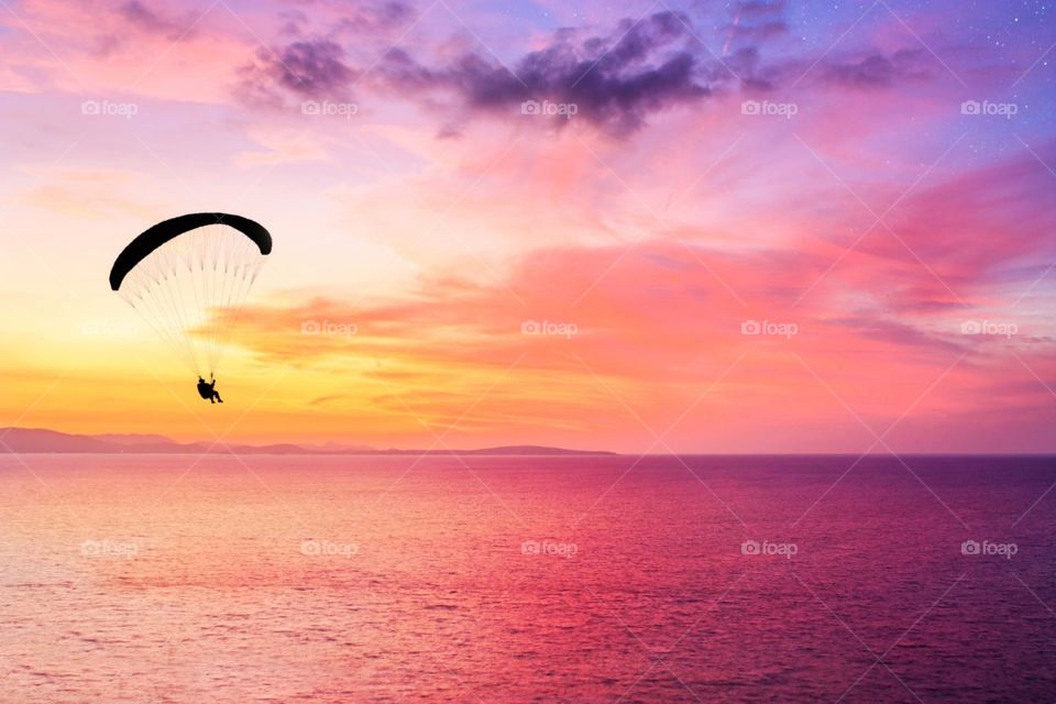 sunset with skydiver