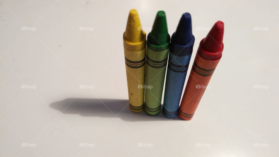 Colored pastels crayons on a table