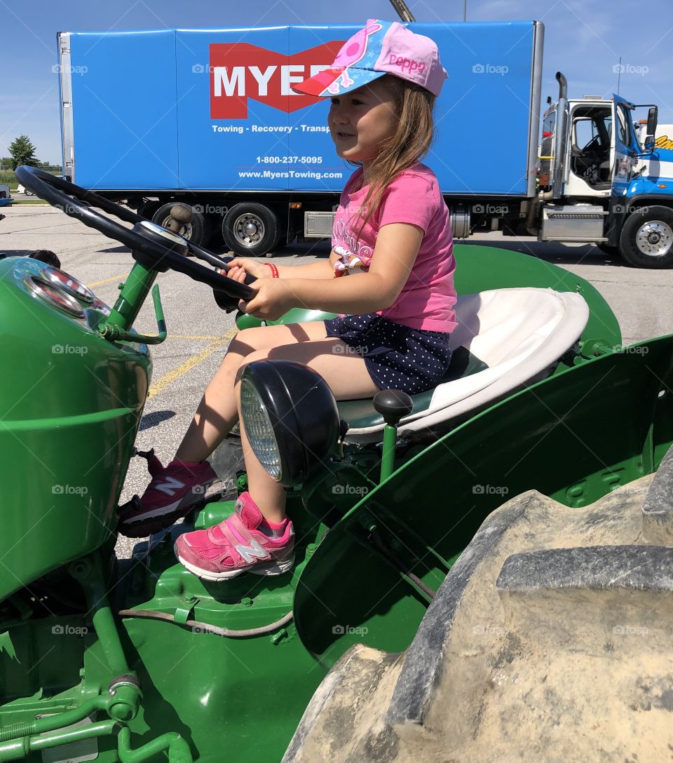 Riding On A Tractor From Point A To Point B