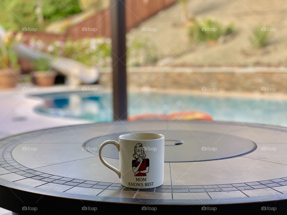 Enjoying coffee in the backyard