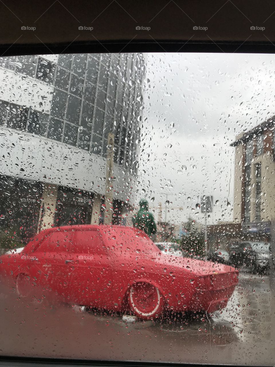 An old car in a rainy day in Tehran,Iran