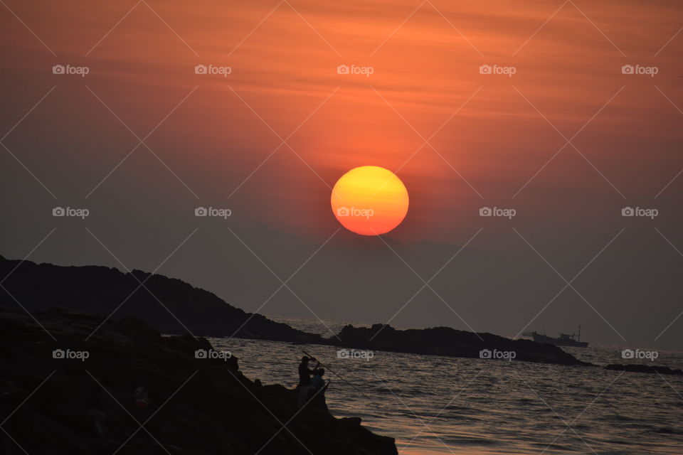 Unforgettable memory of me and my friend during summer vacation.(Here in India,we get summer holidays,because of extreme heat in the summer) We met after long time and enjoyed fishing on the sea shore.We had wonderful summer together.