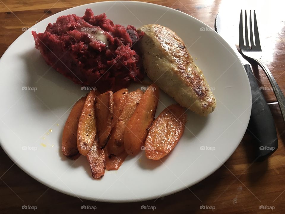 Chicken, carrots and beet red dyed mashed potatoes