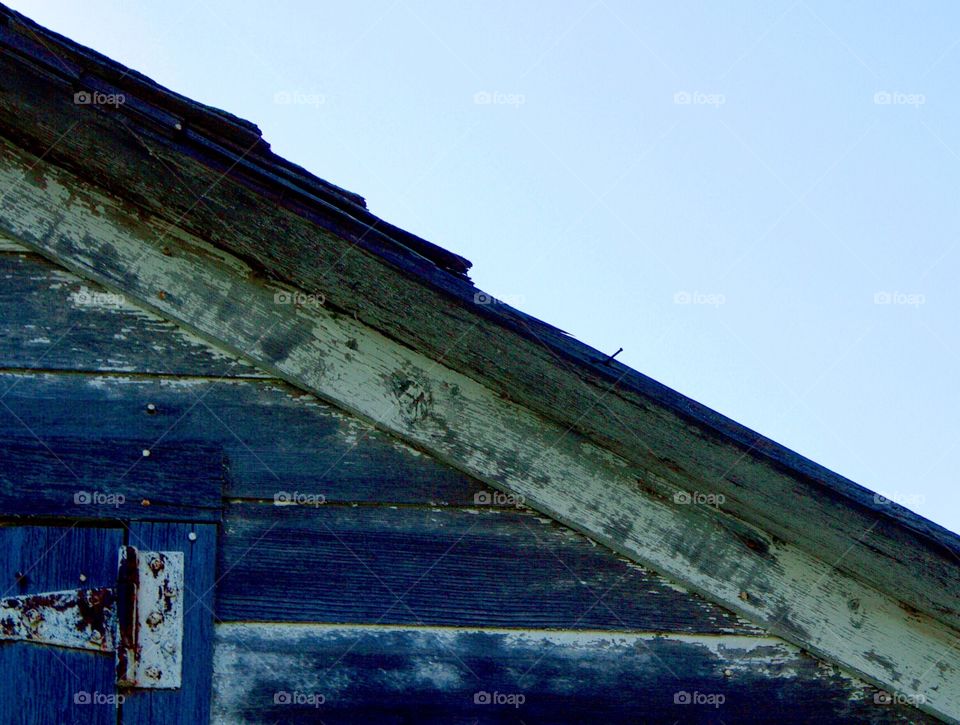 Minimalistic Snaps - shed roof against a clear morning sky