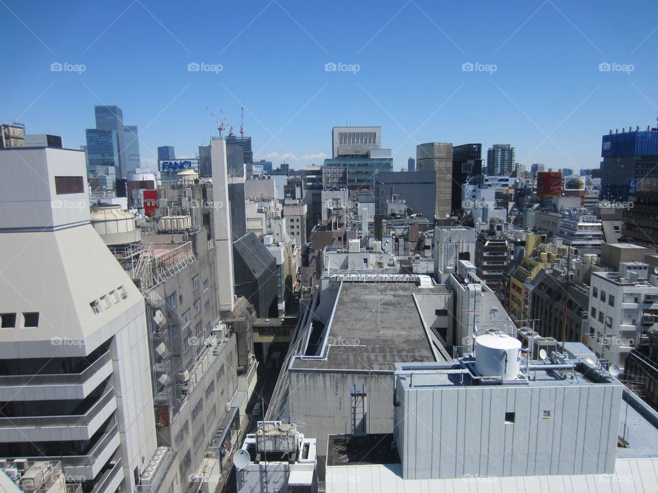 Ginza, Tokyo, Japan.  Skyline from Above the City.  Elevated View of Business and Industrial Buildings.