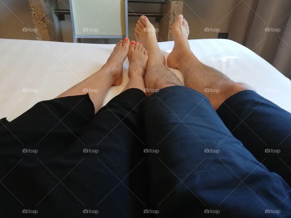 Couple relaxing on the bed