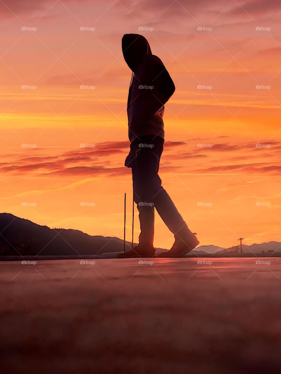 a boy see the sun set