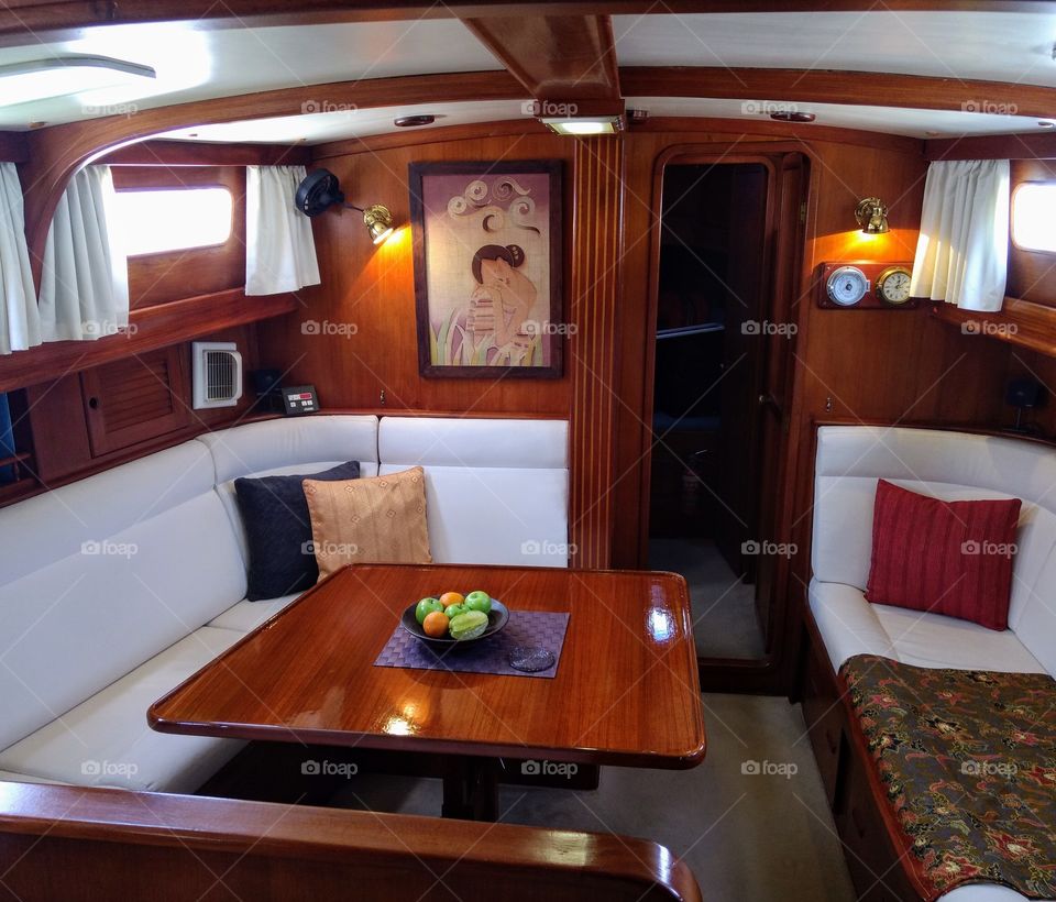 let, boat saloon, dining area, main cabin settee, private 46 foot yacht in Southeast Asia