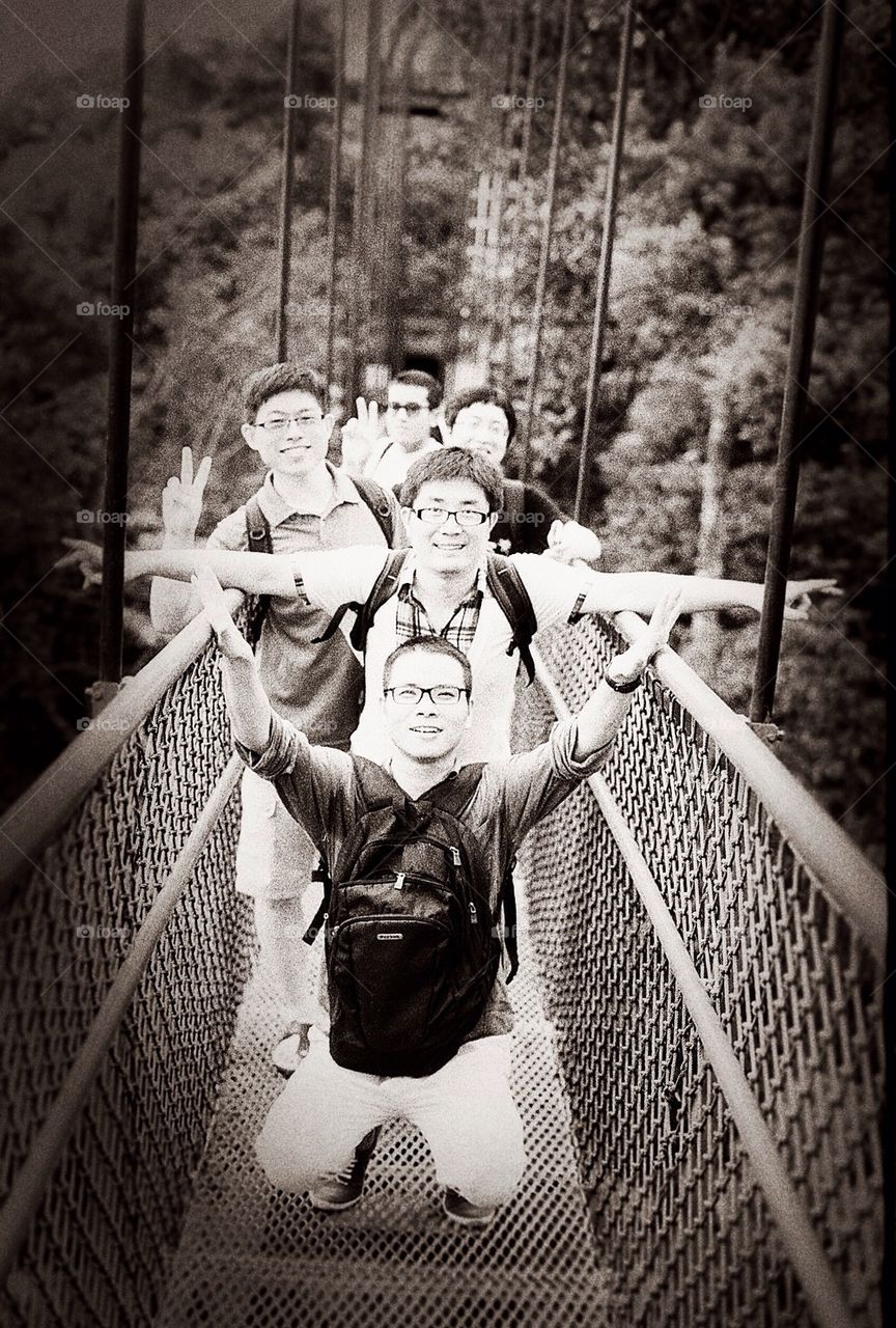 Group of friends on a bridge