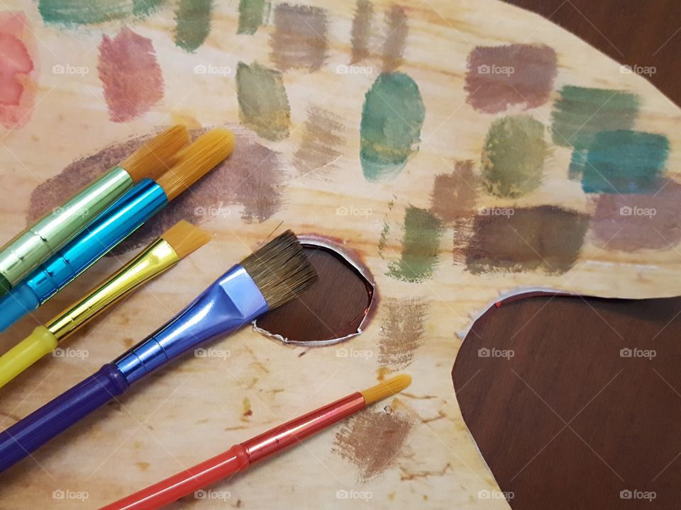 Close-up of paintbrushes on palette