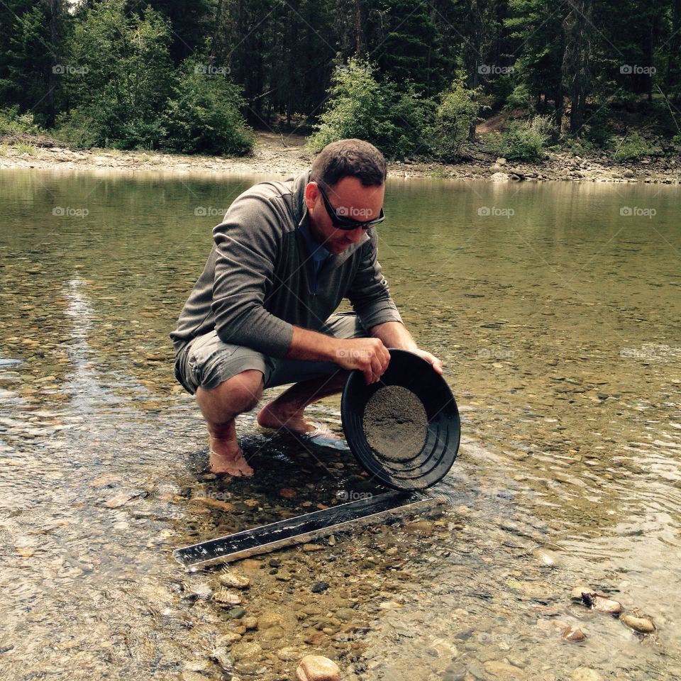 Gold panning on the river