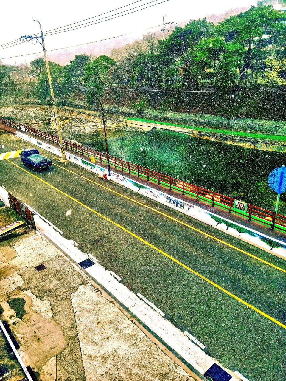 The first snow came at last and took this pictures from our roof top in  tongdosa yangsan city ,south korea.