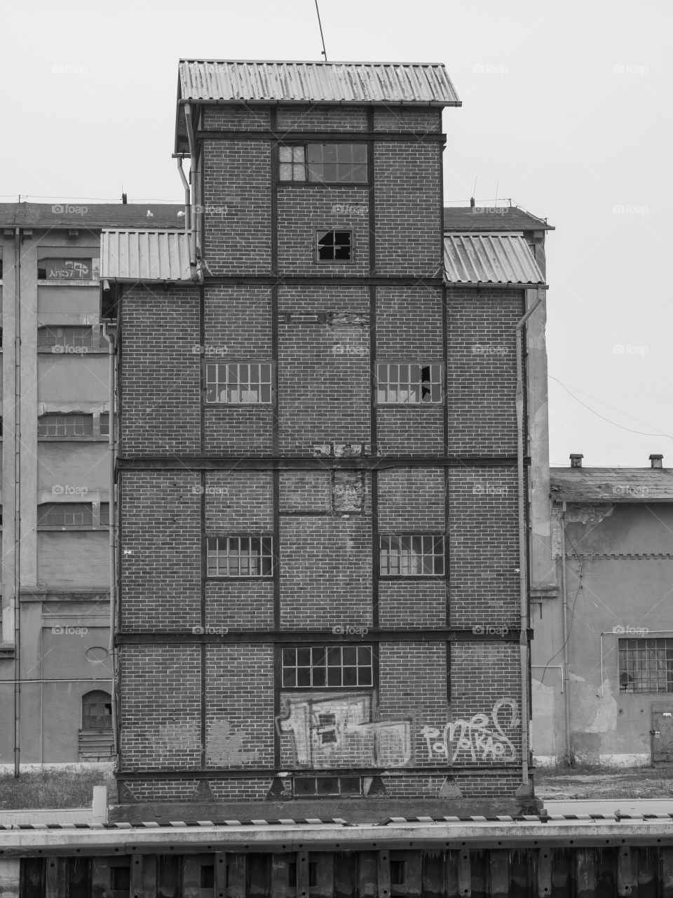 Abandoned buildings on the waterfront