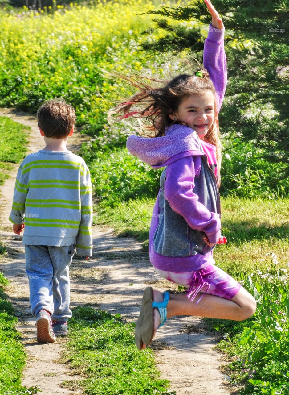 Young Girl Jumping For Joy