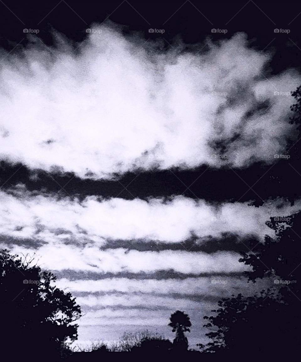 Rows of clouds, moving in the middle of the night.