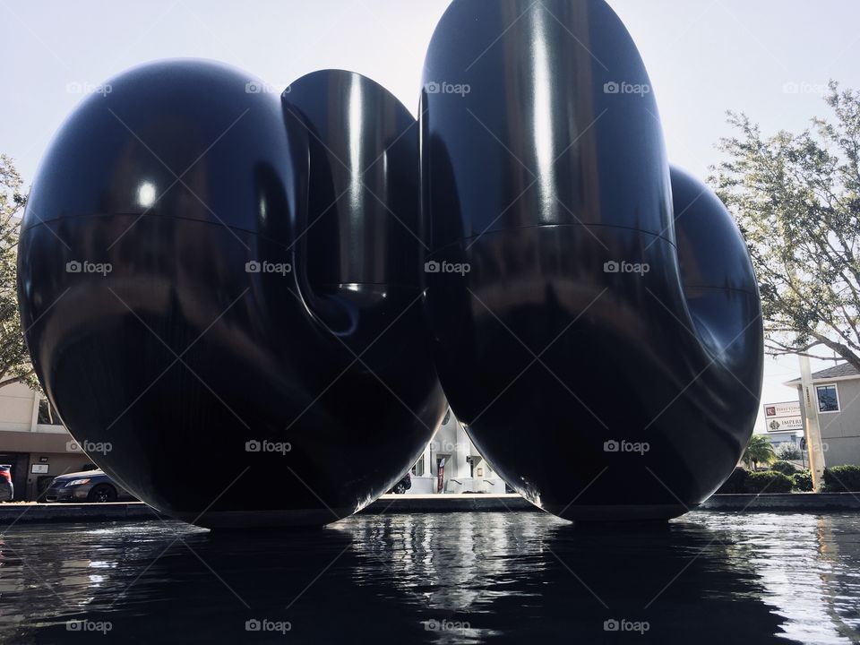 Weird floating sculptures in water